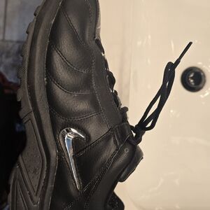 Nike Men's Black Athletic Shoes with Silver Swoosh